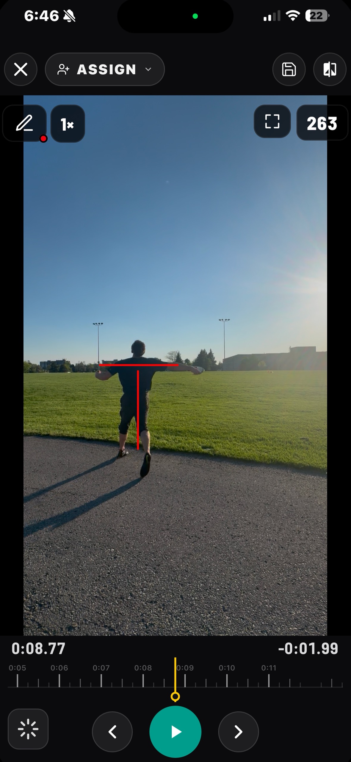 Coach analyzing a throw frame by frame
